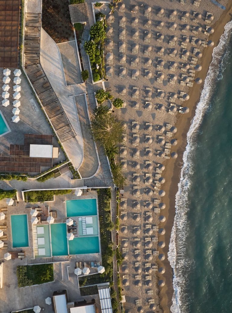 er_rho_helea_lifestyle_aerial_main_pool_beach-1.jpg